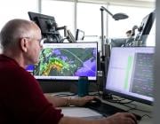 Person looking at aviation computer data 