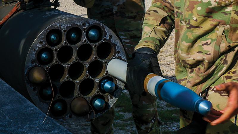 U.S. Army soldier loading Advanced Precision Kill Weapon System