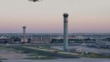 French airport with ATC tower