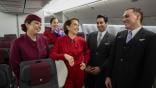 Jayne Hrdlicka, CEO of Virgin Australia, joins crew from both Virgin Australia and Qatar Airways onboard a Qatar Airways Boeing 777 at Brisbane Airport on December 04, 2024 in Brisbane, Australia. 