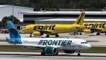 Frontier Airlines and Spirit Airlines aircraft on runway