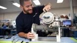 Technician working on component