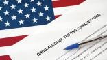Drug/alcohol testing consent form against U.S. flag