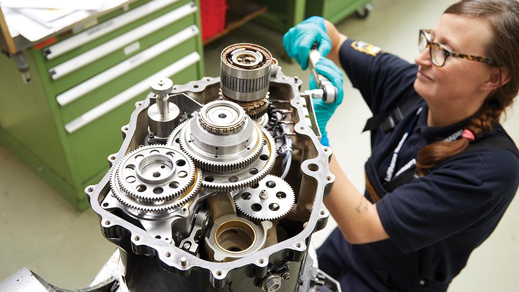 Technician working on integrated drive generator