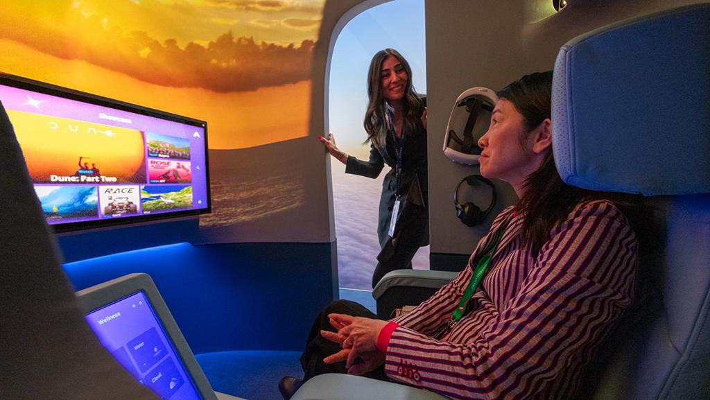 Person in booth looking at FlytEDGE system
