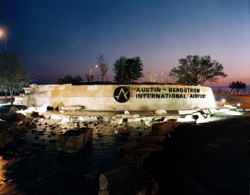 austin bergstrom sign at night