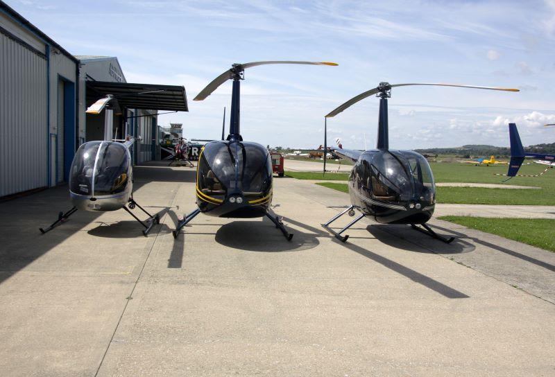 Robinson Helicopters, including an R66. 