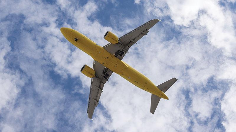 View from below of Spirit Airlines jet flying