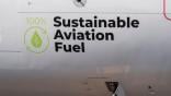 the words "sustainable aviation fuel" on the side of an aircraft