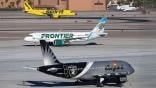 Three Airbus jets on runway, from top: Spirit Airlines, Frontier, Allegiant